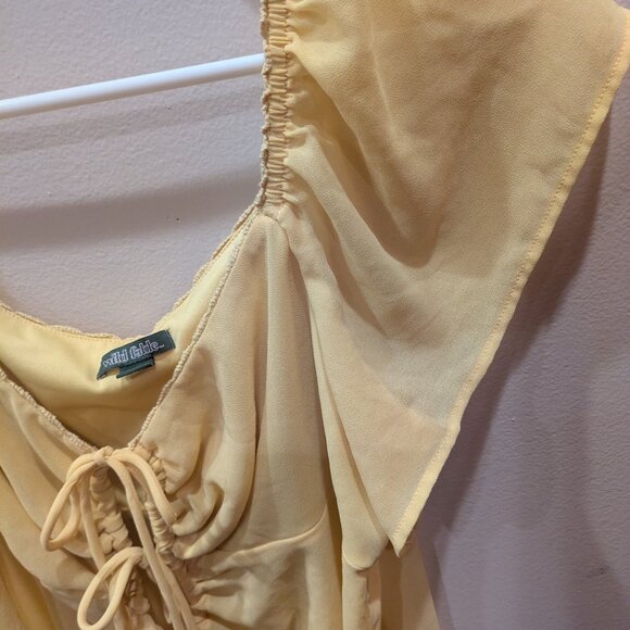 Flowy yellow sheer top with bows - Picture 2 of 6